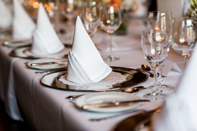 Close-up of place setting on dining table