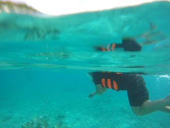 Person swimming in sea