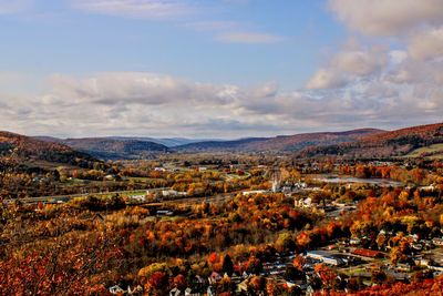 Scenic view of landscape against sky during autumn