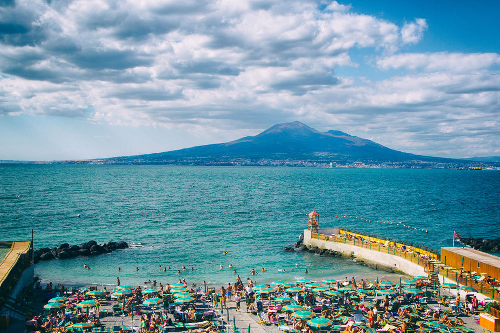 PEOPLE ON SEA AGAINST SKY