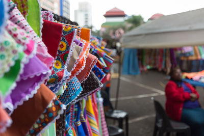 Close-up of colorful dresses in market