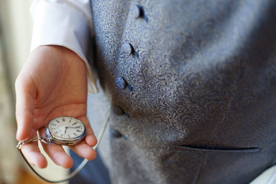 Close-up of man working at home