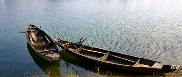 High angle view of boat moored in lake