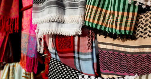 Close-up of clothes hanging at market stall