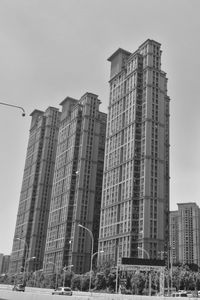 Low angle view of modern buildings against sky