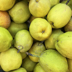 Box of green anjous pear at the market
