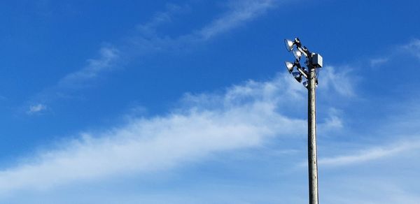 Low angle view of street light against sky