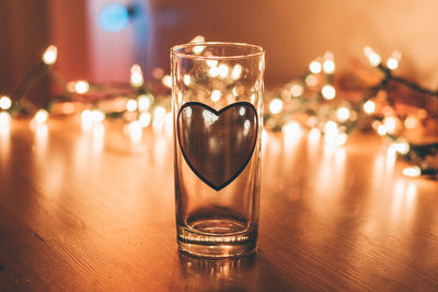 Close-up of wine glass on table