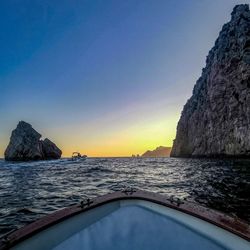 Scenic view of sea against clear sky during sunset