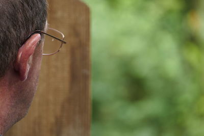 Cropped image of man wearing eyeglasses