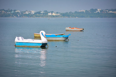 Boats in the upper lake at bhopal which is also known as 'city of lakes'.