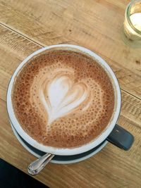 High angle view of cappuccino on table