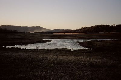 Scenic view of lake against clear sky