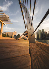 Scenic view of sea and buildings against sky