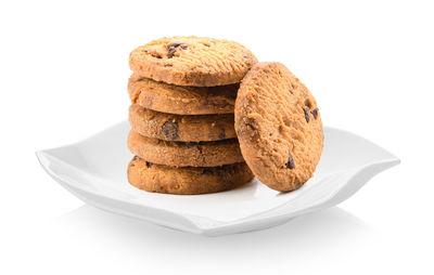 Close-up of cookies against white background