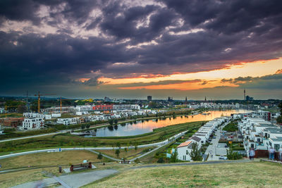 Panoramic view of cityscape against sky during sunset