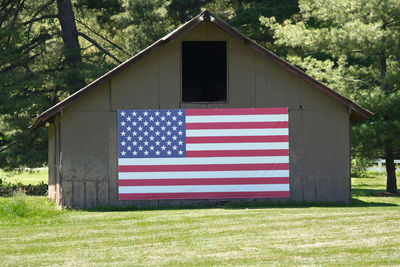 Scenic view of flag on field