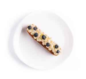 Close-up of food in plate on white background