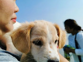 Close-up of woman with dog