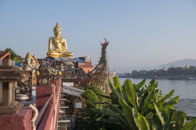 Statue of historic building against clear sky