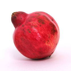 Close-up of apple against white background