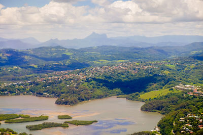 Scenic view of landscape and mountains against sky