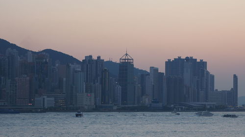 View of buildings against sky during sunset