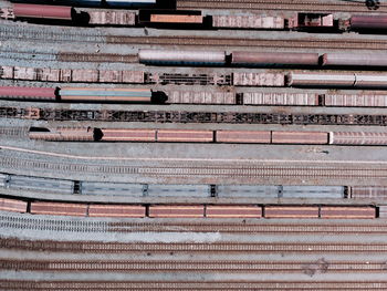 Aerial view from flying drone of trains on the railway station