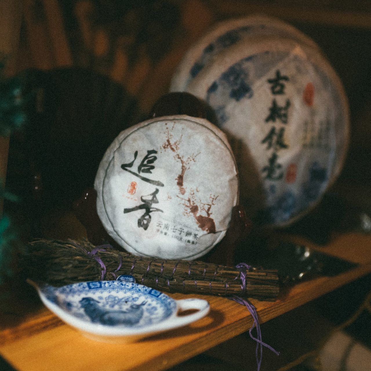 indoors, close-up, no people, text, number, focus on foreground, communication, selective focus, still life, western script, food and drink, clock, table, art and craft, old, accuracy, food, shape, time, minute hand