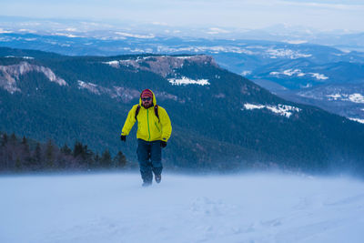 Man hiking in winter