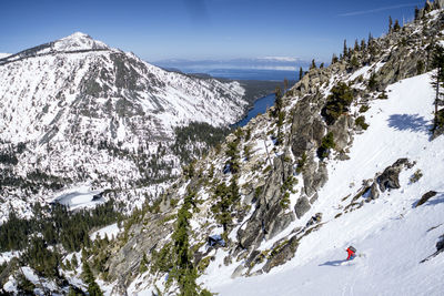 Mid forties man skiing down backcountry at washington pass