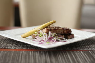 Close-up of food in plate on table