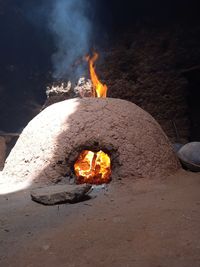 Bonfire on rock at night