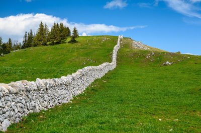 Scenic view of land against sky