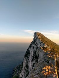 Scenic view of sea against sky at sunset