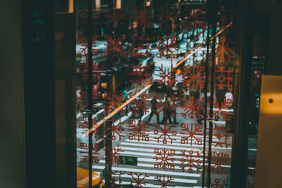 Reflection of building on glass window