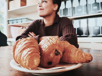 Close-up of croissants on table