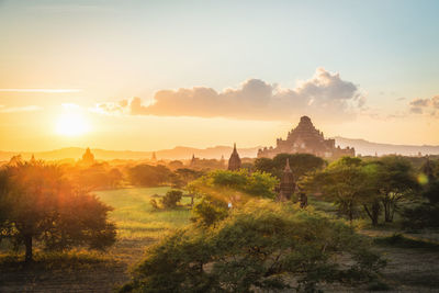 Panoramic view of temple against sky during sunset