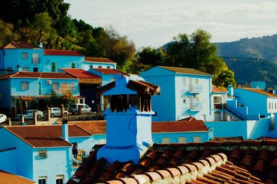 Houses against blue sky