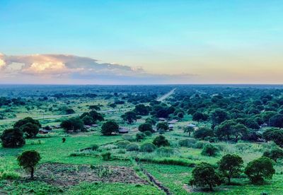 Scenic view of landscape against sky during sunset