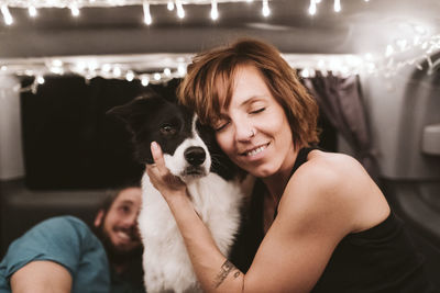 Portrait of woman with dog