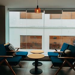 Empty chairs and table in restaurant