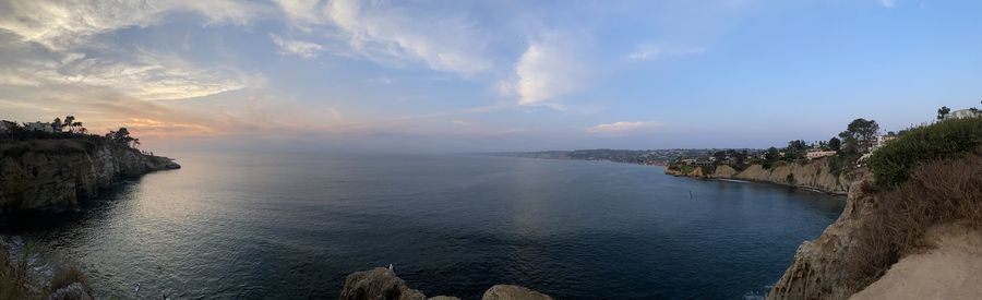 Panoramic view of sea against sky during sunset