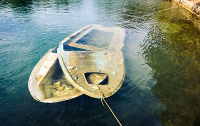 High angle view of boat moored in sea