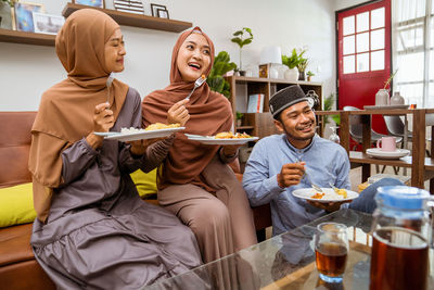 Family celebrating eid at home