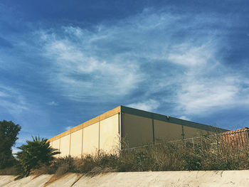 View of building against cloudy sky