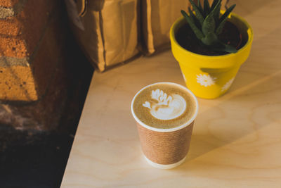 Close-up of coffee cup on table