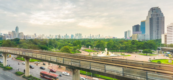 High angle view of city buildings against sky