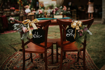 Empty chairs and table at restaurant