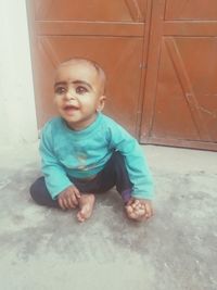 Portrait of cute baby girl at home